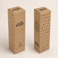Cajas de cartón kraft para fragancias ambientales de la marca Inhala, con diseño minimalista y motivos florales. Ideales